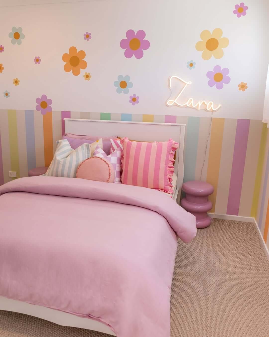 Cozy lavender bedding enhances a playful kids room design